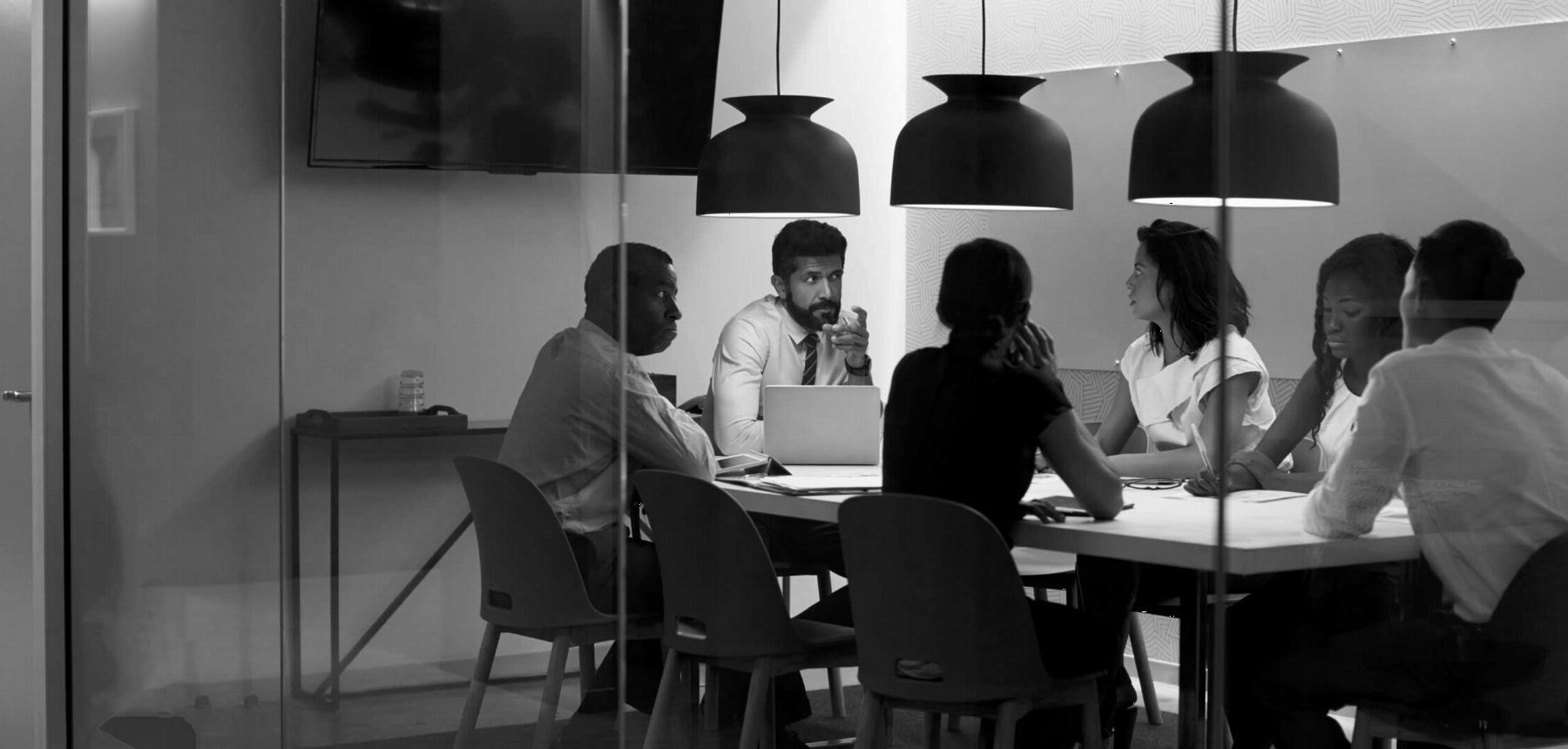 Eminence accountants in a client meeting